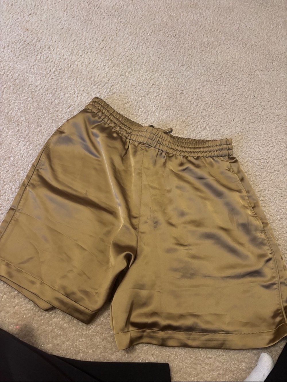 SKIMS sporty satin loose shorts in gold
